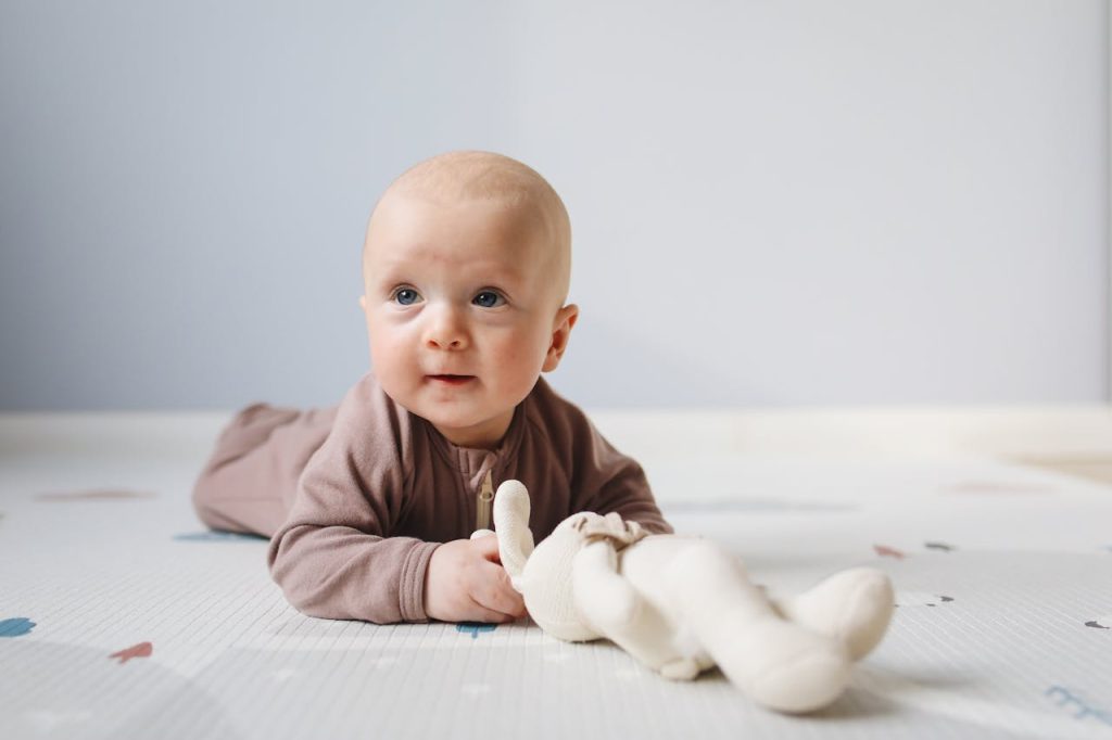 photo-of-baby-lying-on-bed-3875222 Photo of Baby Lying On Bed